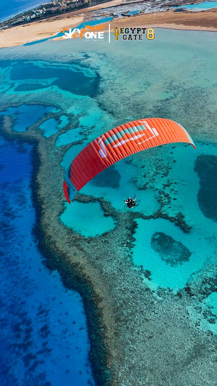 Paramotor over a Red Sea reef